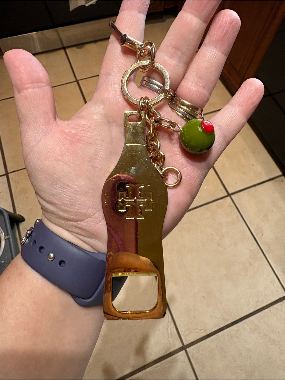 Tory Burch Gold-Tone Bottle Opener Key Holder with Olive Charm